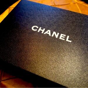 Classic Chanel wallet/clutch on chain shoulder strap.  Teal blue.